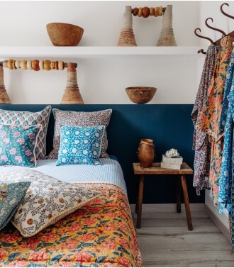 Printed cushions and indian quilt by Jamini