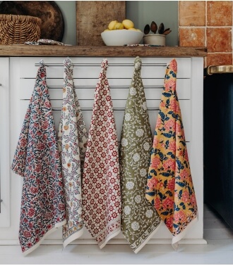 Hand printed floral kitchen towels by Jamini Design
