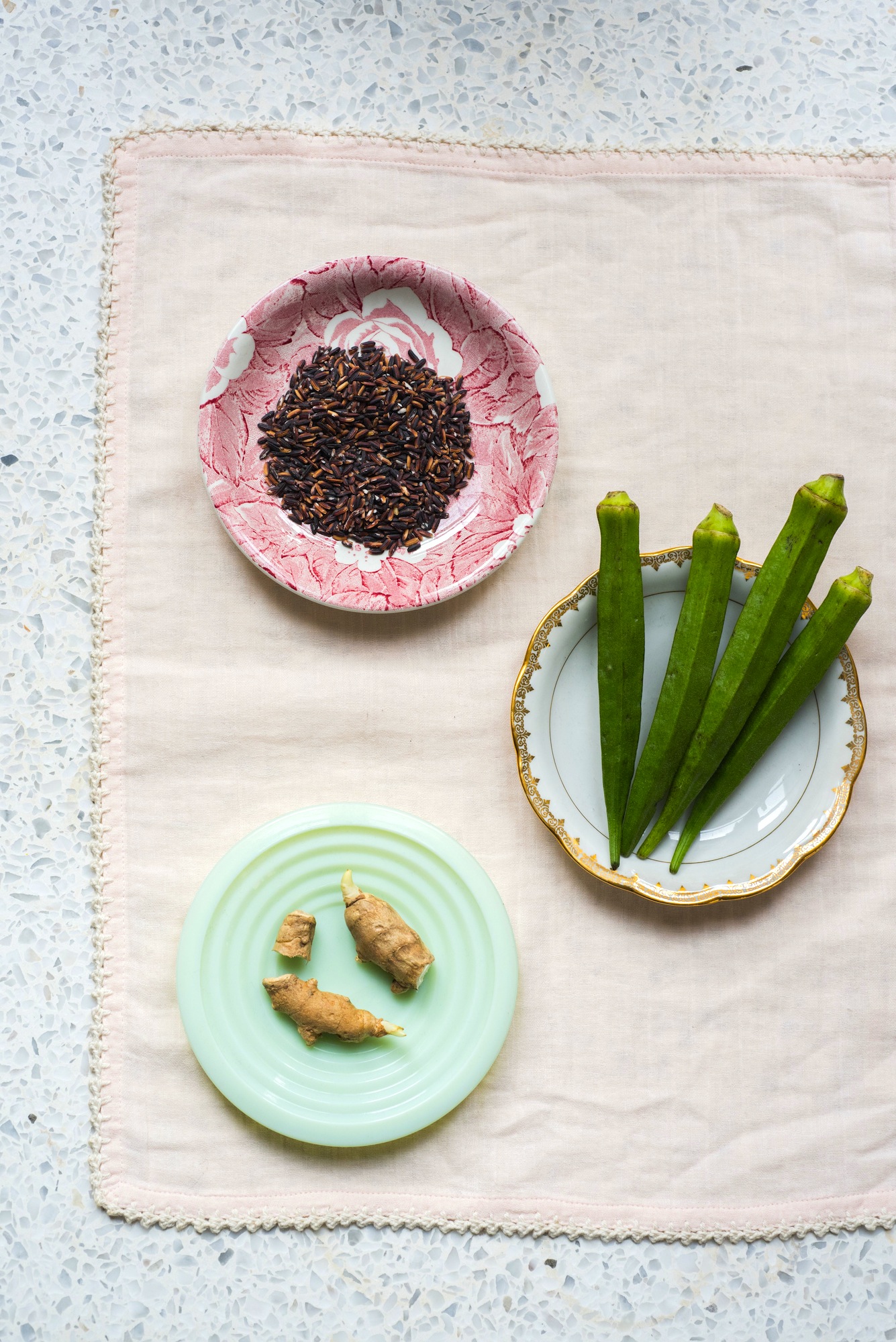 three plates with several ingredients