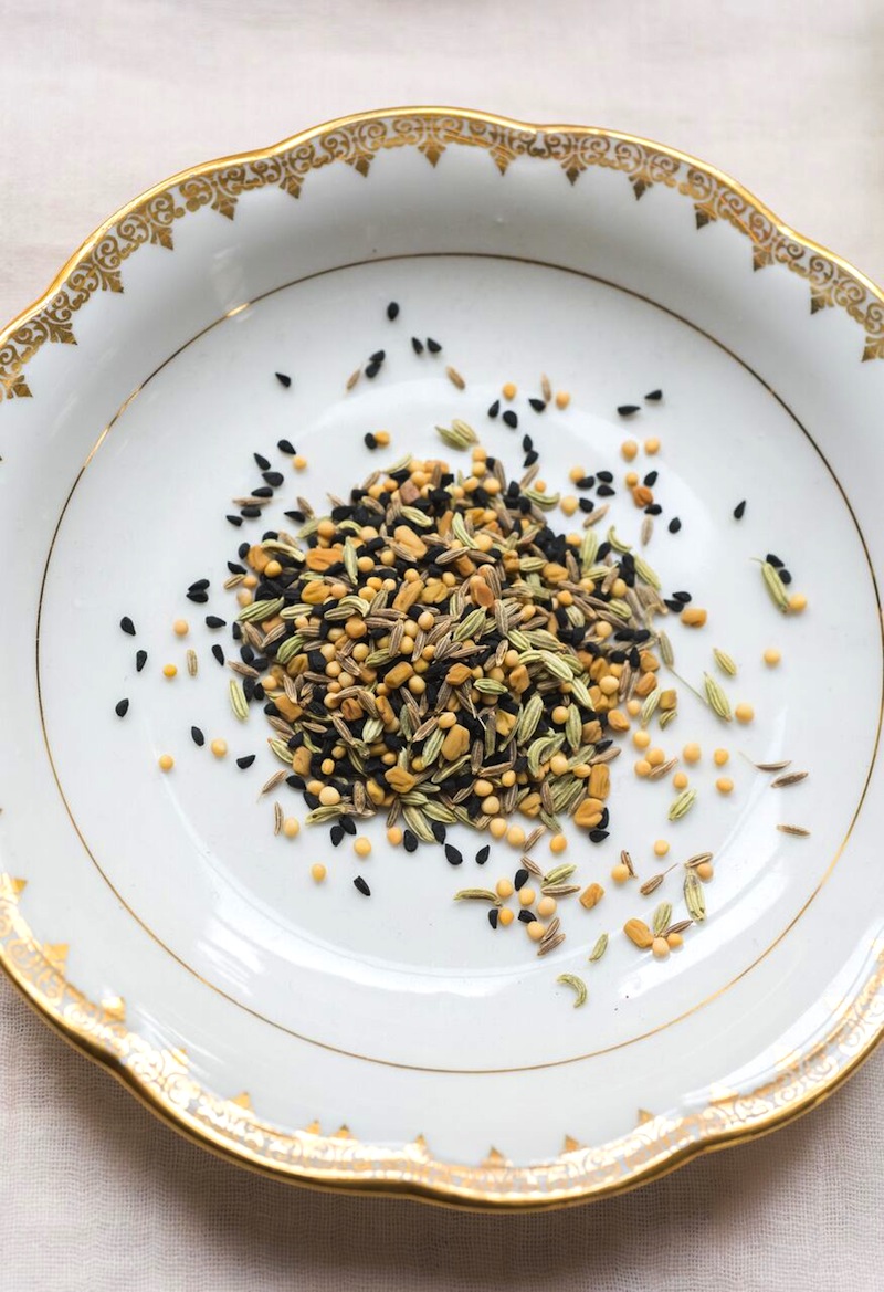 three plates with seeds