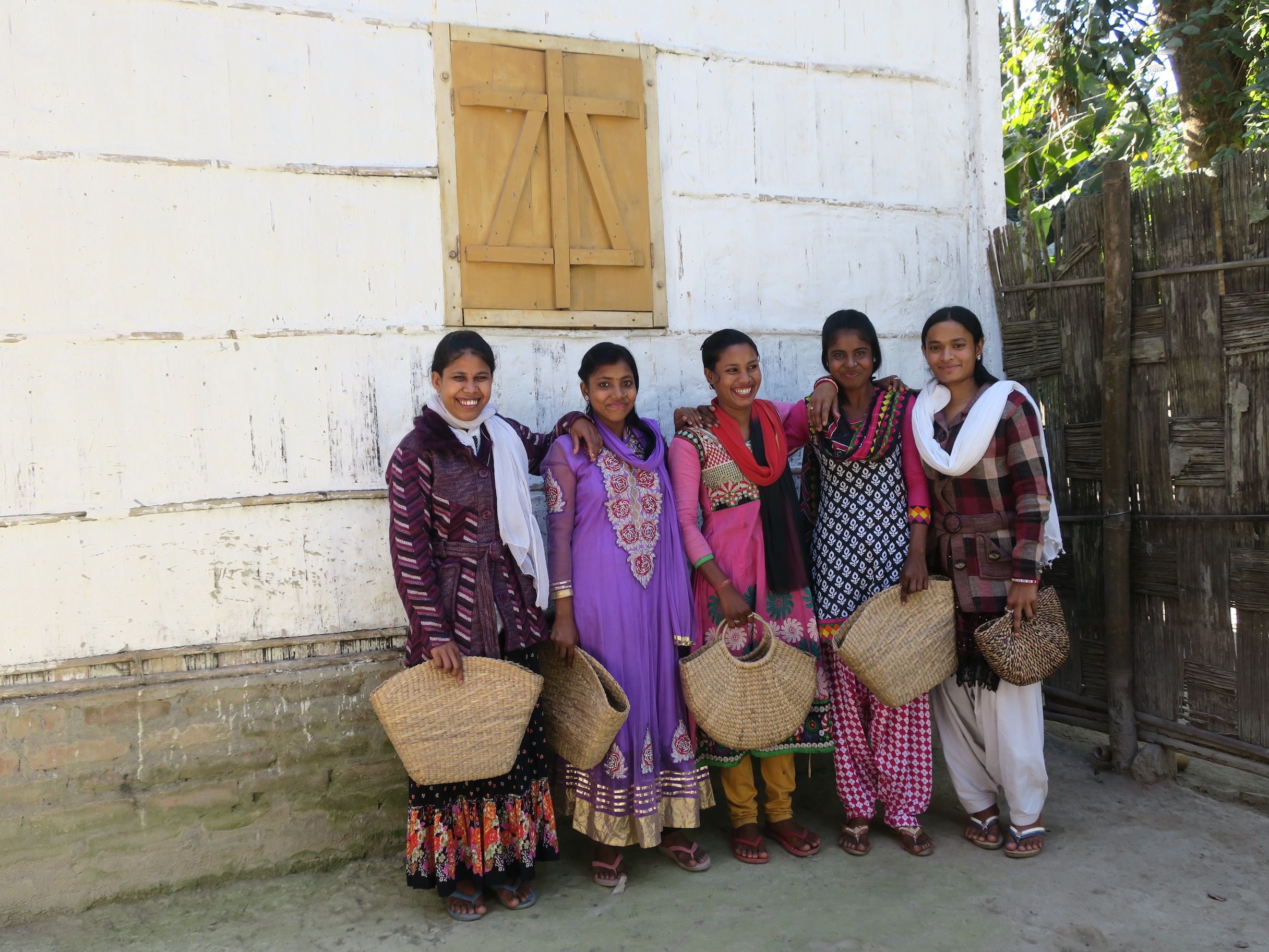 artisans modeling baskets