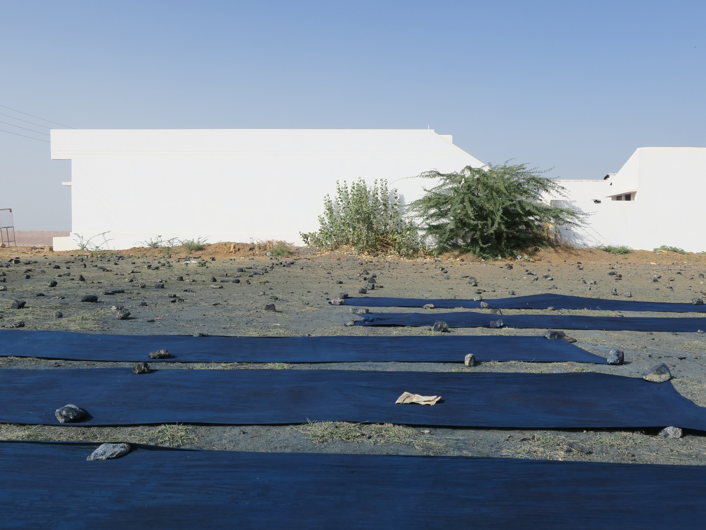 Indigo dyed fabrics drying in the sun