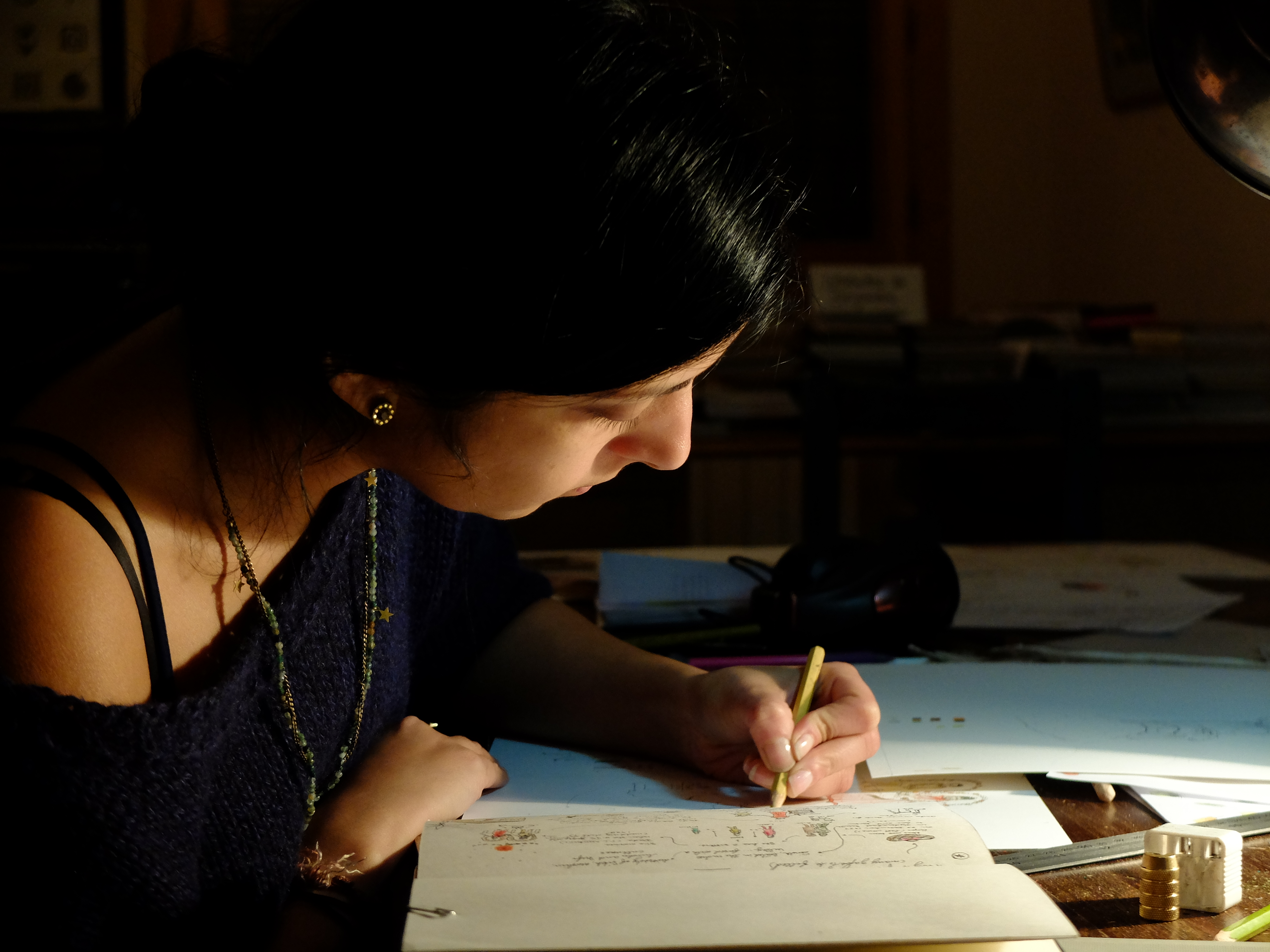 Karishma draws on paper