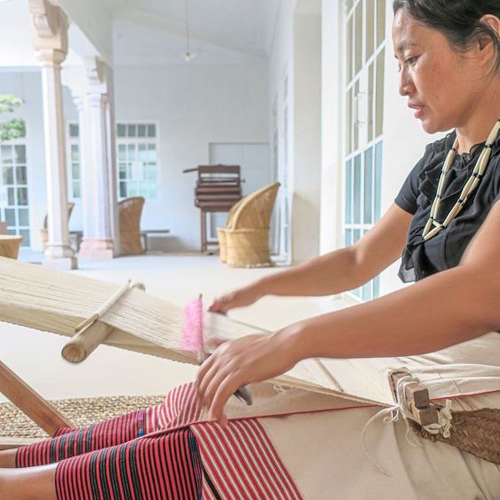 Indian woman weaving, India